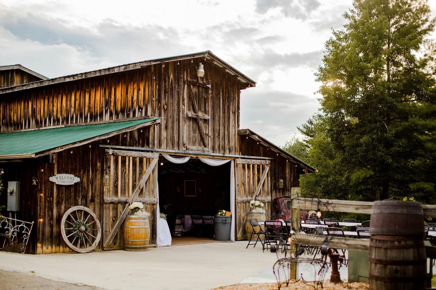 The barn exterior with a wagon wheel